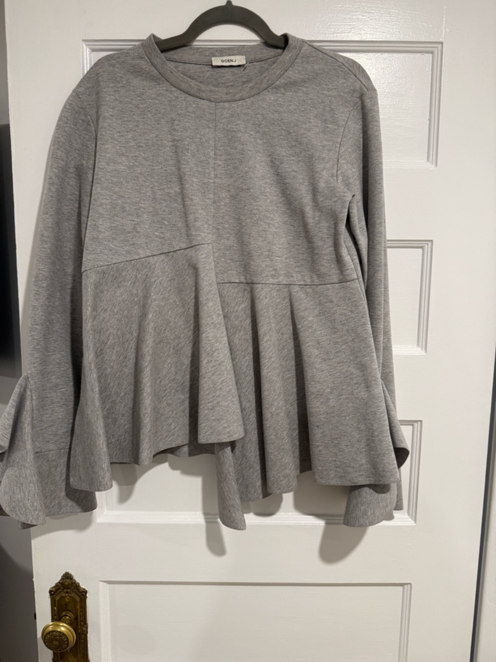 Geon J Ruffled Peplum Long Sleeve Top